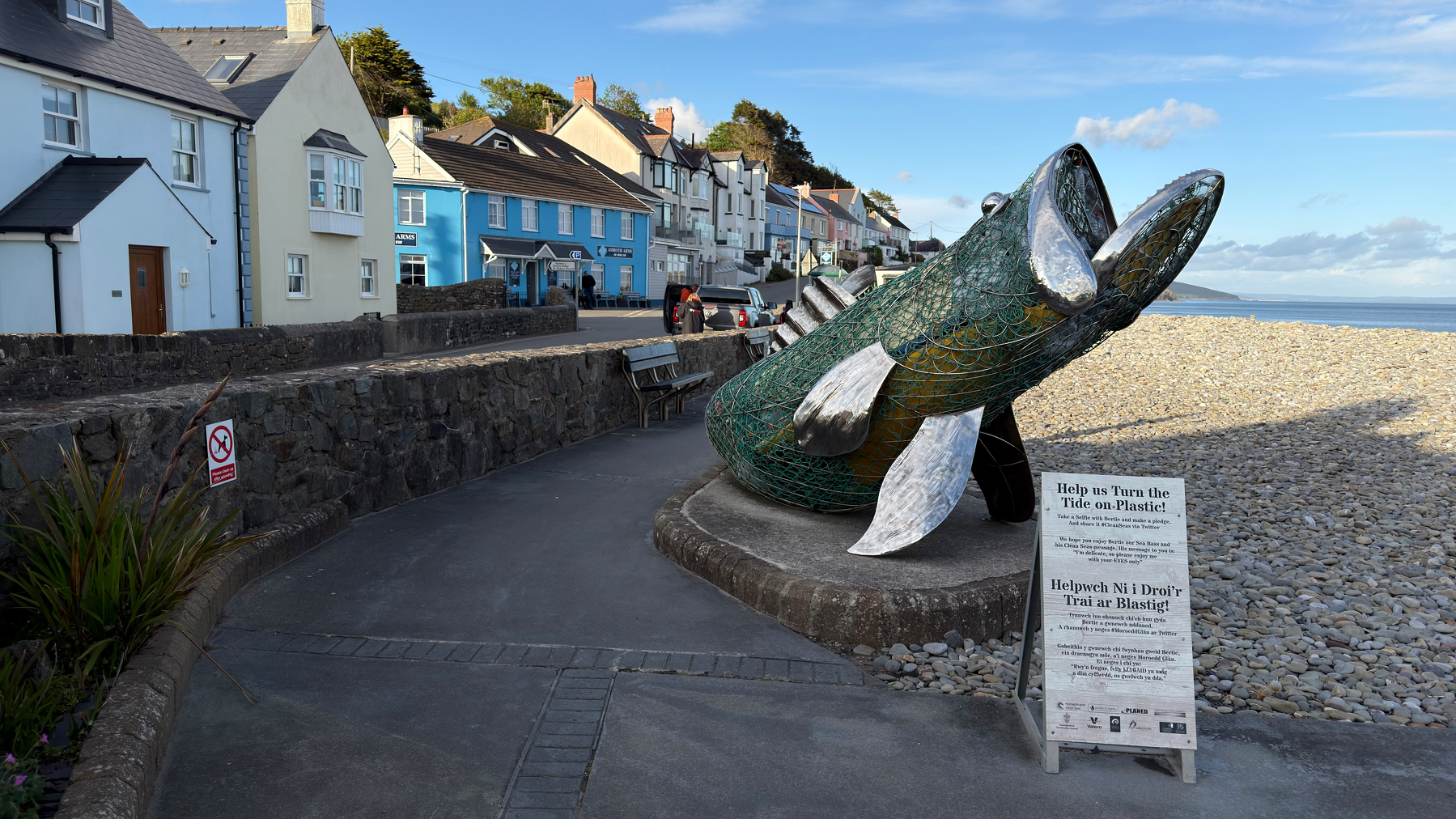 A chalkboard sign emphasizes the importance of quality, freshness, and supporting local Welsh businesses, with the slogan KEEP IT REAL, KEEP IT WELSH! at the bottom.